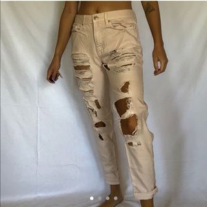 Light pink distressed boyfriend jeans